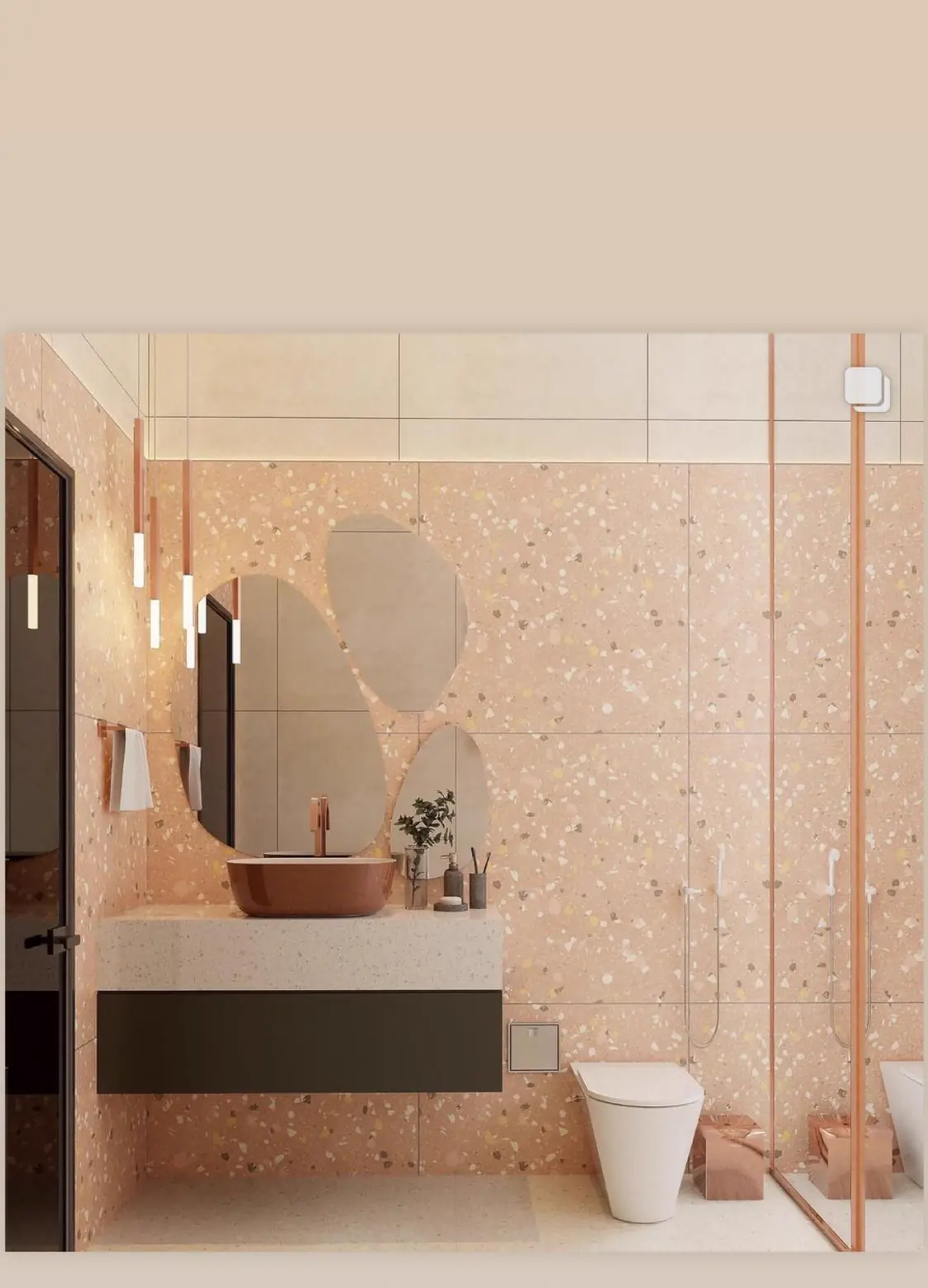 Banheiro com revestimento terrazzo e cuba de cobre