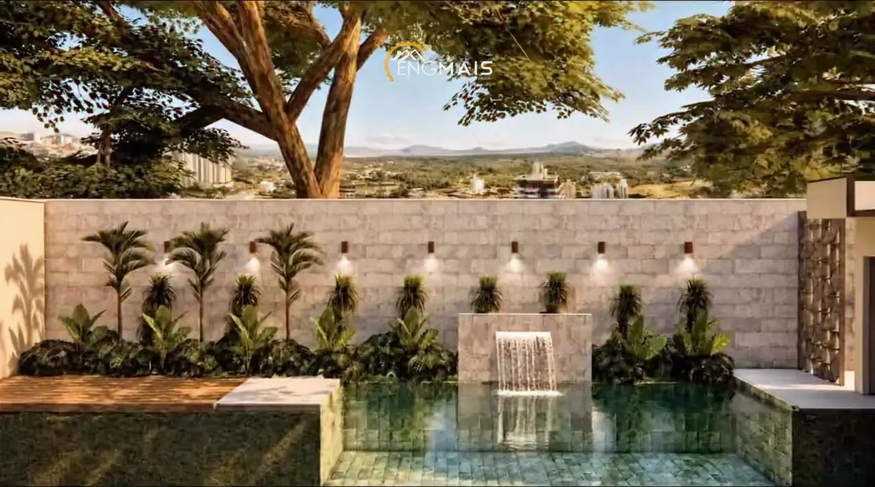 Área de lazer com piscina, cascata e muro de pedra
